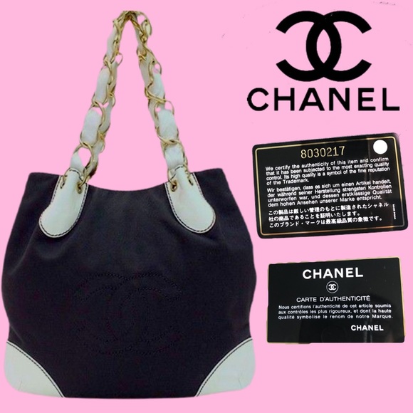 CHANEL Handbags - CHANEL Black Canvas white Leather CC Signature Bag